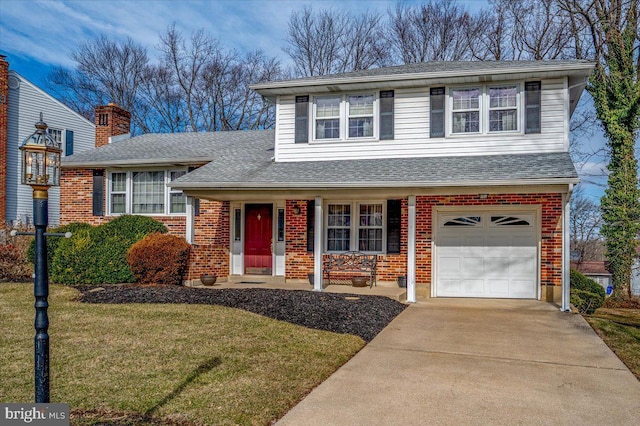 split level home with a garage and a front yard