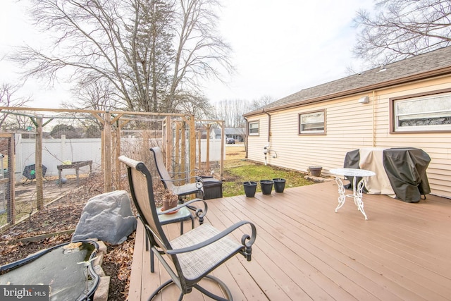 wooden deck with area for grilling