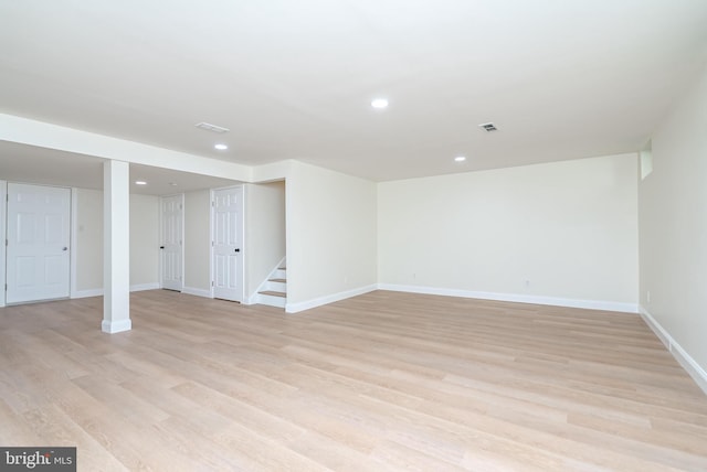 basement featuring light wood-type flooring