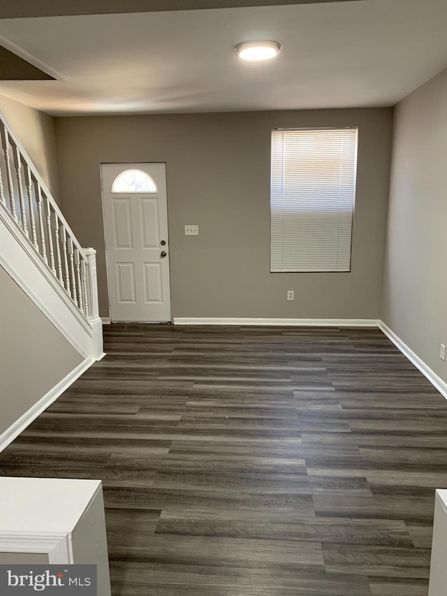 foyer featuring dark hardwood / wood-style floors