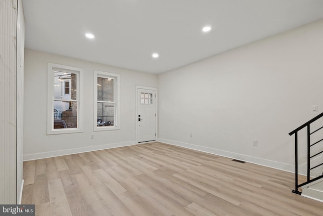 entrance foyer featuring light hardwood / wood-style floors