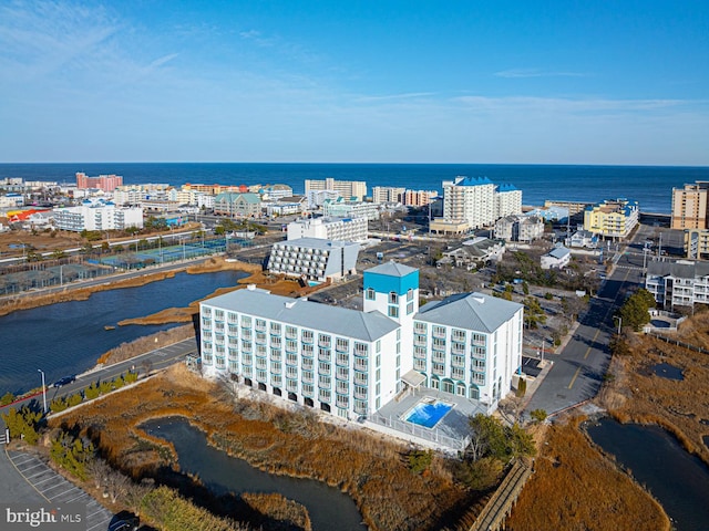 drone / aerial view with a water view