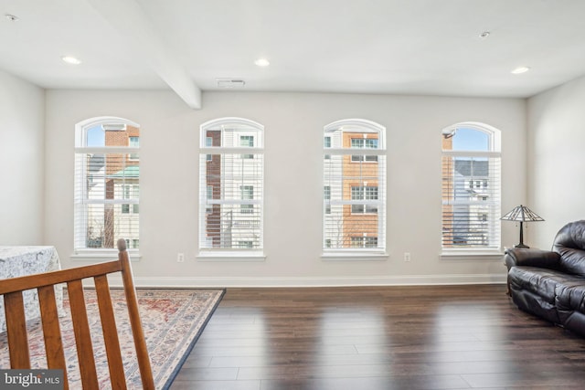 bedroom featuring recessed lighting, beamed ceiling, baseboards, and dark wood-style flooring