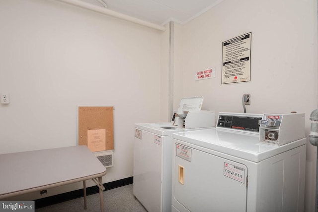 laundry room with separate washer and dryer