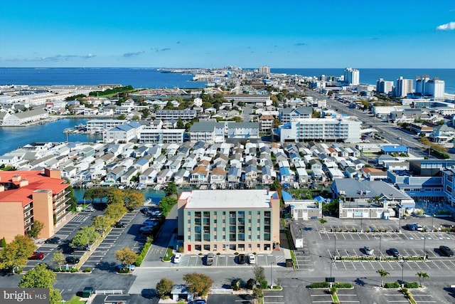 drone / aerial view with a water view