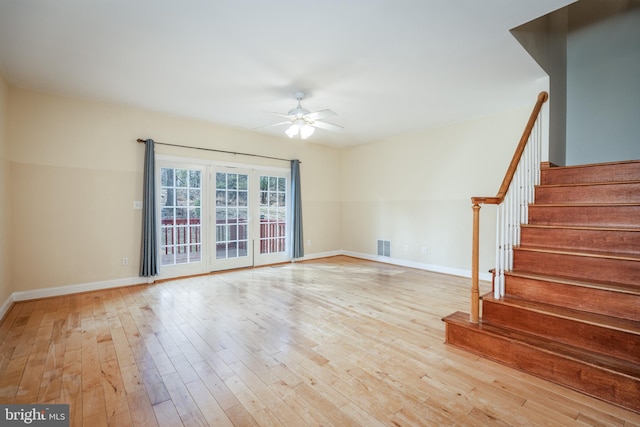 unfurnished room featuring ceiling fan and light hardwood / wood-style flooring