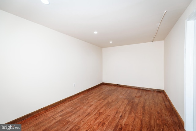 empty room featuring hardwood / wood-style floors