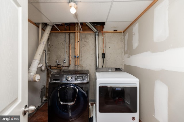 washroom featuring independent washer and dryer