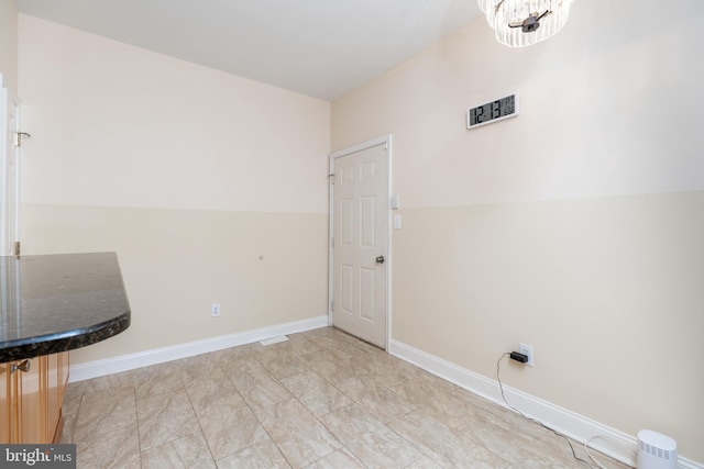 interior space with a notable chandelier