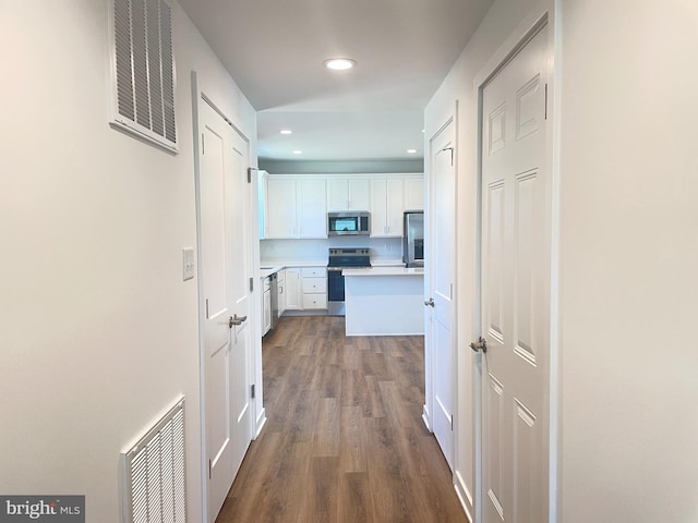 106 Thyme Way, Bunker Hill, WV 25413 - hallway with dark wood-type flooring and recessed lighting