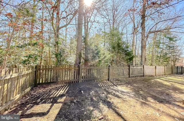 view of yard featuring fence