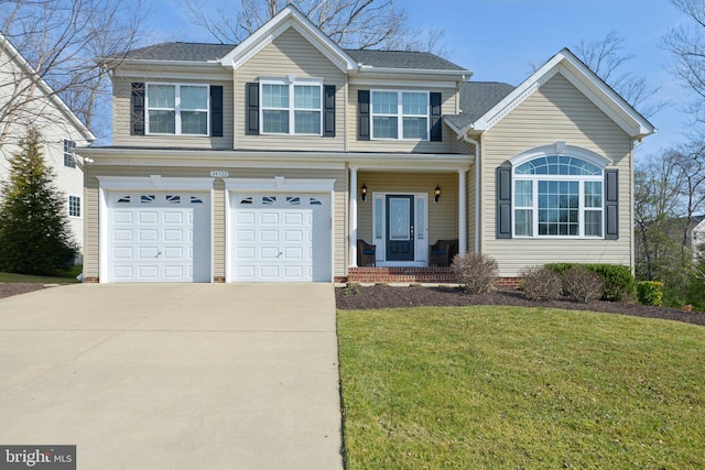 traditional-style house featuring concrete driveway, an attached garage, and a front lawn