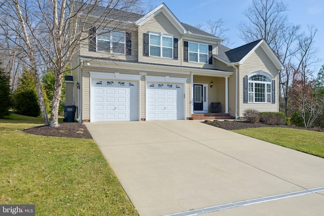 traditional-style home with an attached garage, concrete driveway, and a front lawn