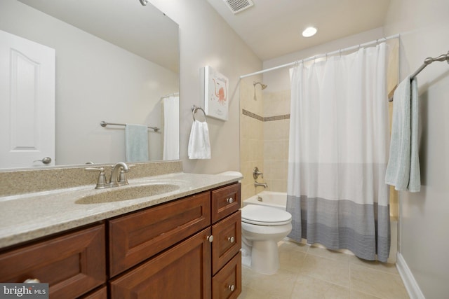 bathroom featuring visible vents, toilet, tile patterned flooring, shower / bath combination with curtain, and vanity