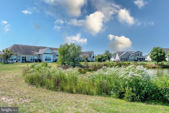 view of yard with a water view