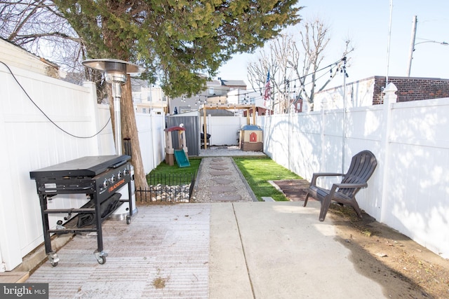 view of patio with a fenced backyard