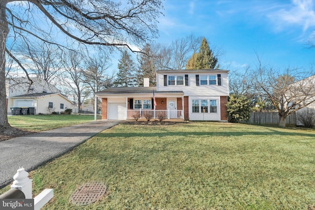 view of front of house with a porch and a front lawn