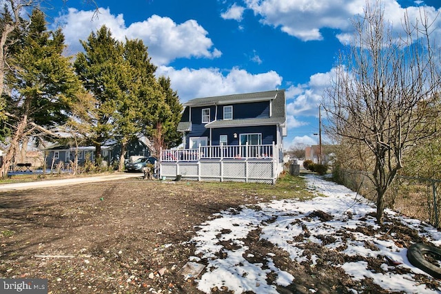 view of front of property featuring a deck