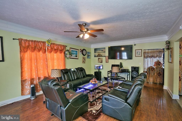 living area featuring ornamental molding, a ceiling fan, a textured ceiling, wood finished floors, and baseboards