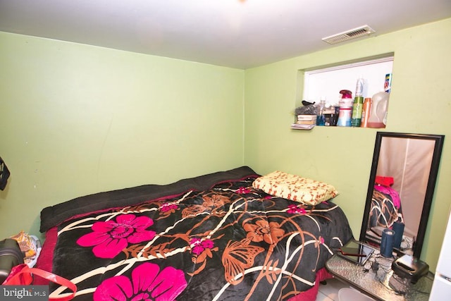 bedroom with visible vents