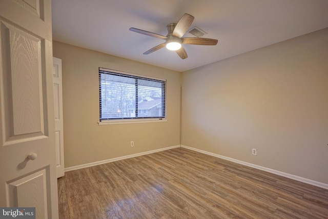 unfurnished bedroom featuring ceiling fan and light wood-type flooring