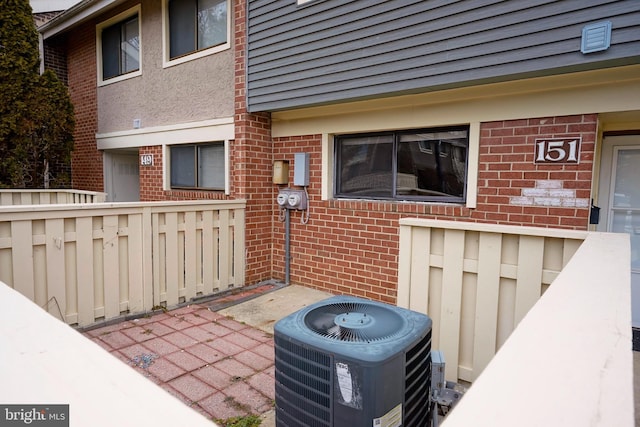 view of patio featuring cooling unit