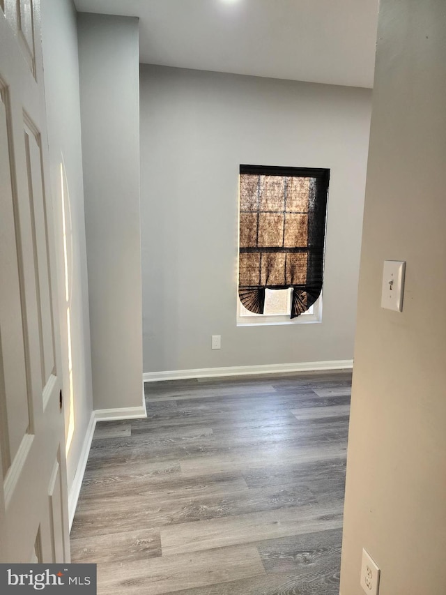 spare room featuring hardwood / wood-style floors