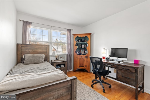 bedroom featuring light hardwood / wood-style floors