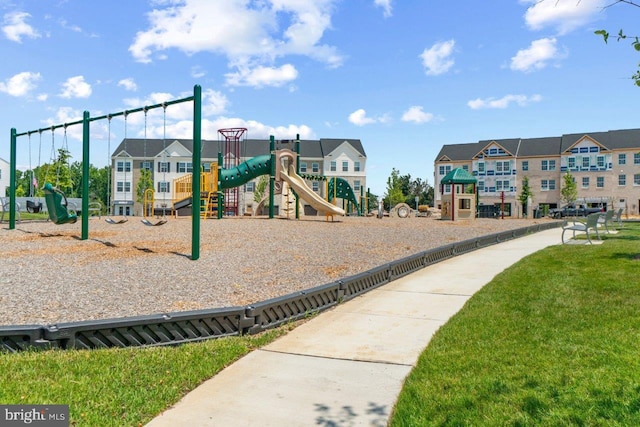 view of playground with a yard