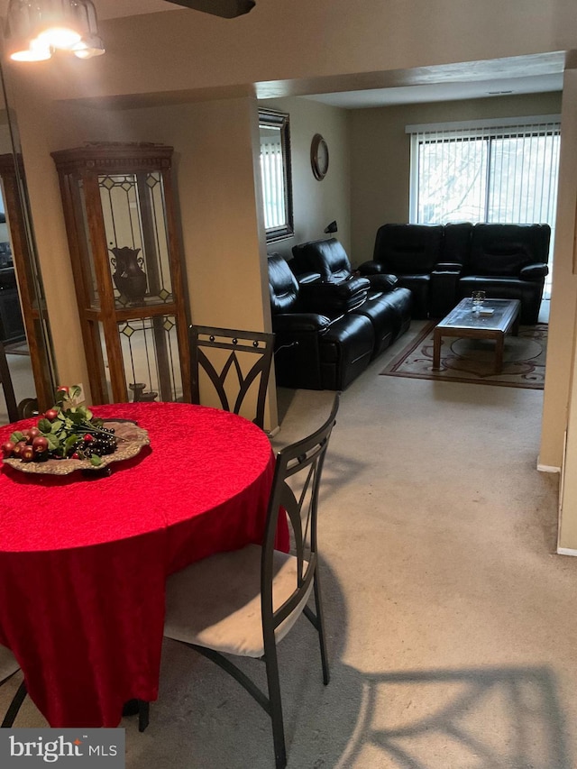 view of carpeted dining space