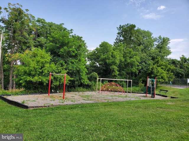 view of play area with a yard