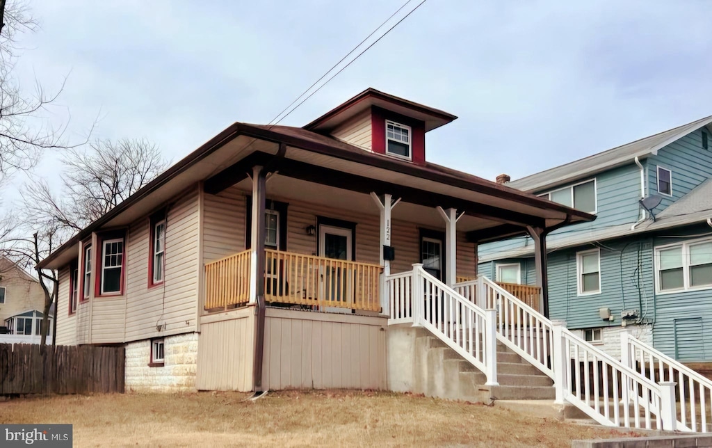 view of front of home featuring covered porch