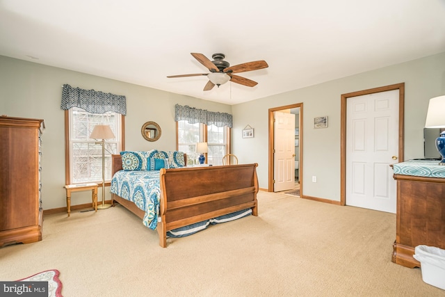 bedroom featuring light carpet and ceiling fan