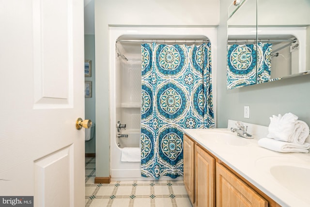 bathroom with vanity and shower / bath combination with curtain