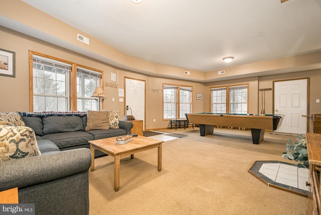 carpeted living room featuring pool table