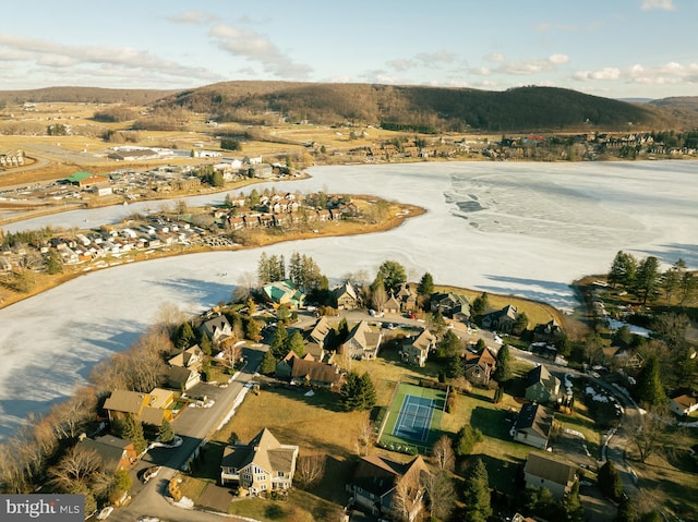 drone / aerial view featuring a mountain view