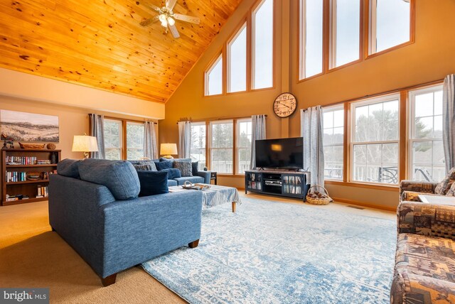 living room with high vaulted ceiling, carpet floors, wooden ceiling, and ceiling fan