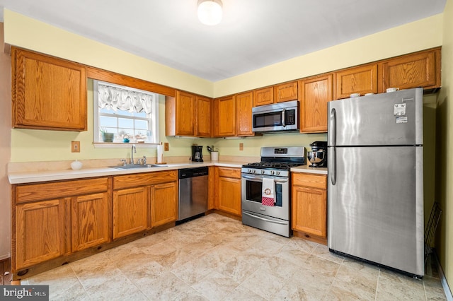 kitchen featuring appliances with stainless steel finishes and sink