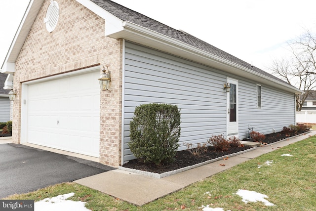 view of property exterior featuring a garage