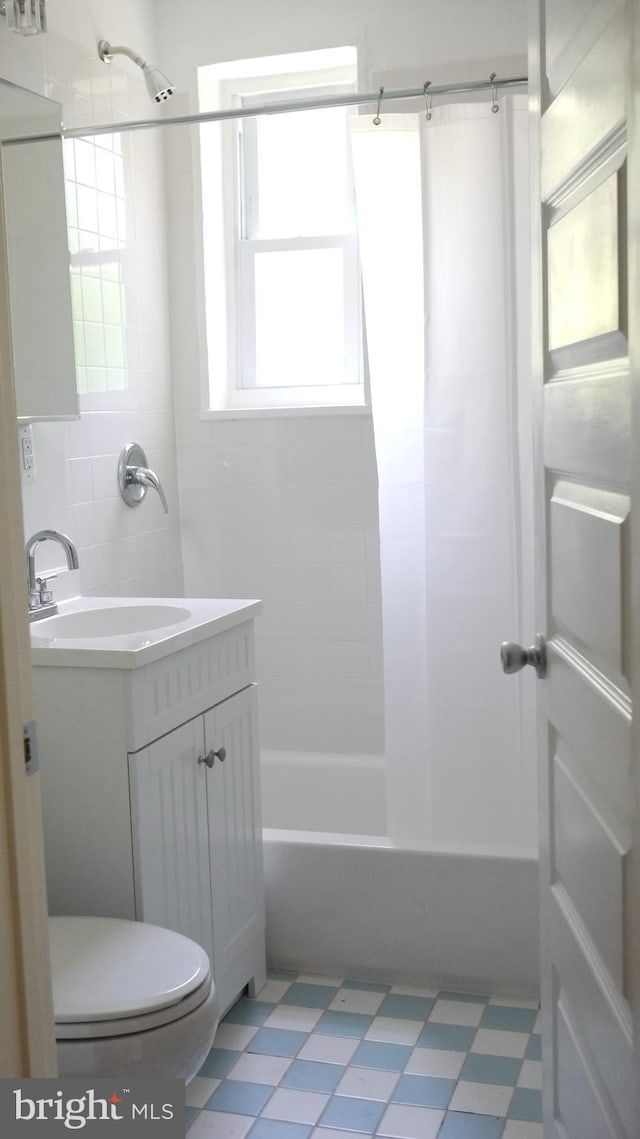 full bathroom with vanity, shower / washtub combination, and toilet