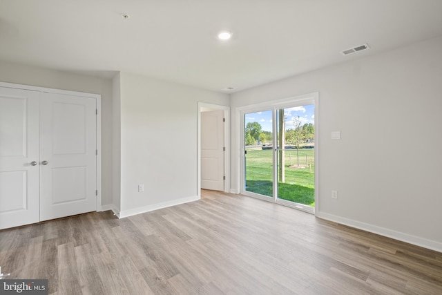 empty room featuring light wood-type flooring