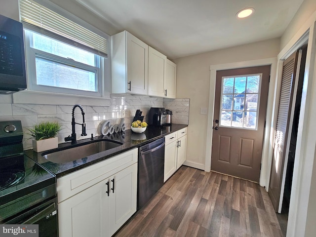 kitchen with sink, white cabinetry, dark hardwood / wood-style floors, and black appliances