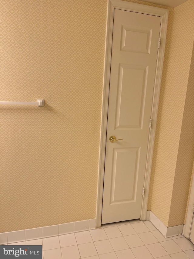 bathroom with tile patterned flooring