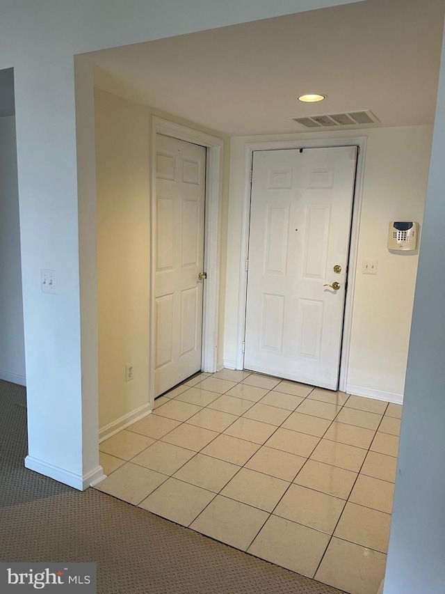 interior space with light tile patterned flooring