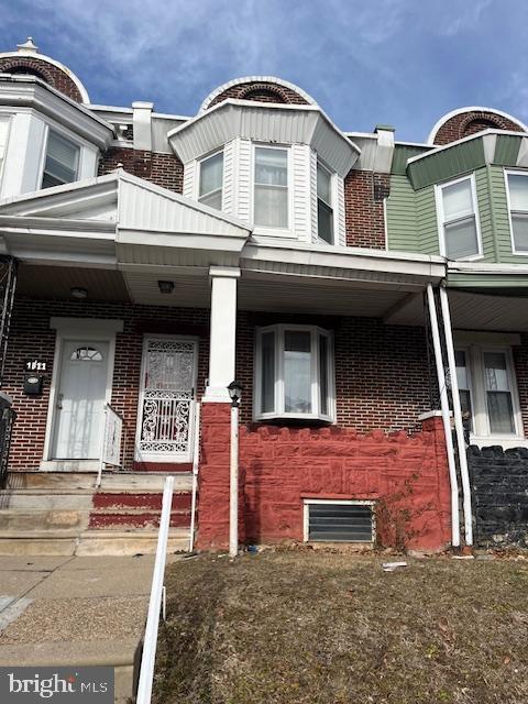 view of property with a porch