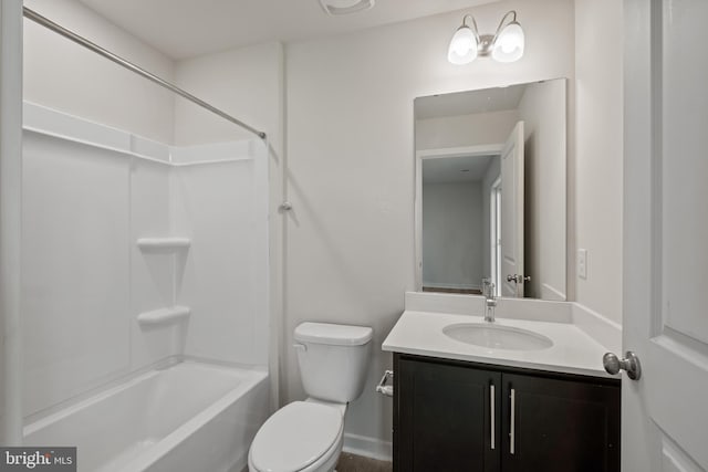 full bathroom featuring vanity, bathing tub / shower combination, and toilet