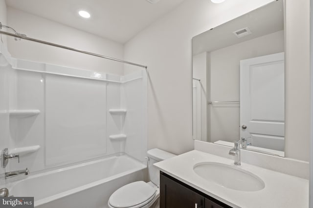 full bathroom with toilet, vanity, and bathtub / shower combination