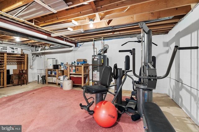 workout area featuring water heater