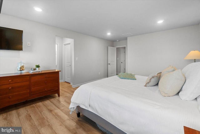 bedroom featuring light wood-type flooring