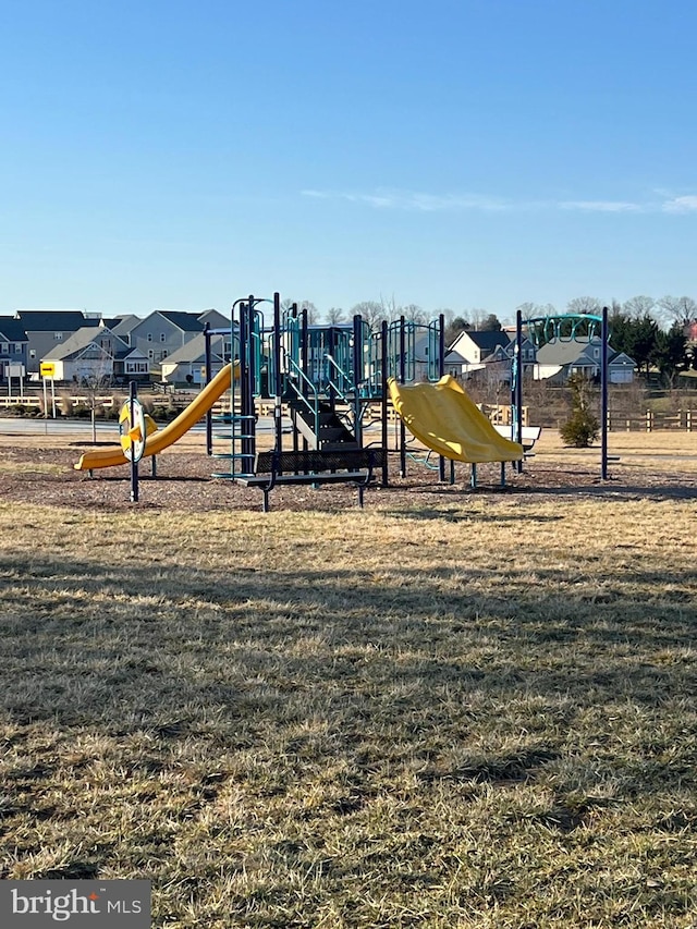 view of playground featuring a yard